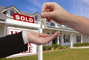 real-estate-handing-over-keys-istock